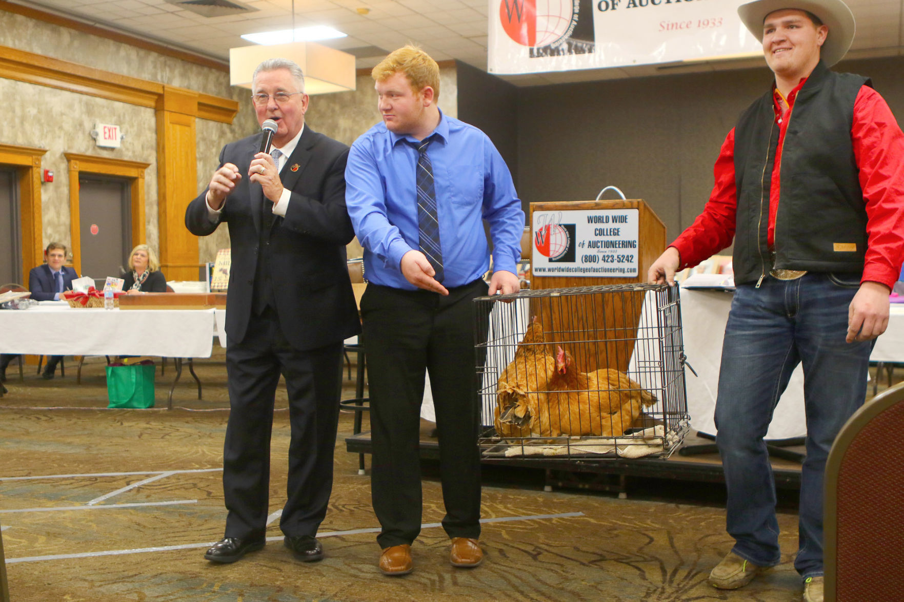 Paul Behr auctioning off chickens
